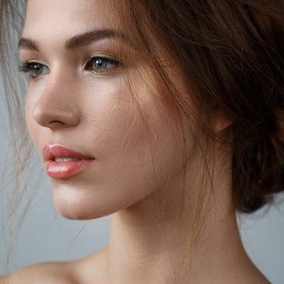 Portrait of beautiful woman with natural make up and hairstyle